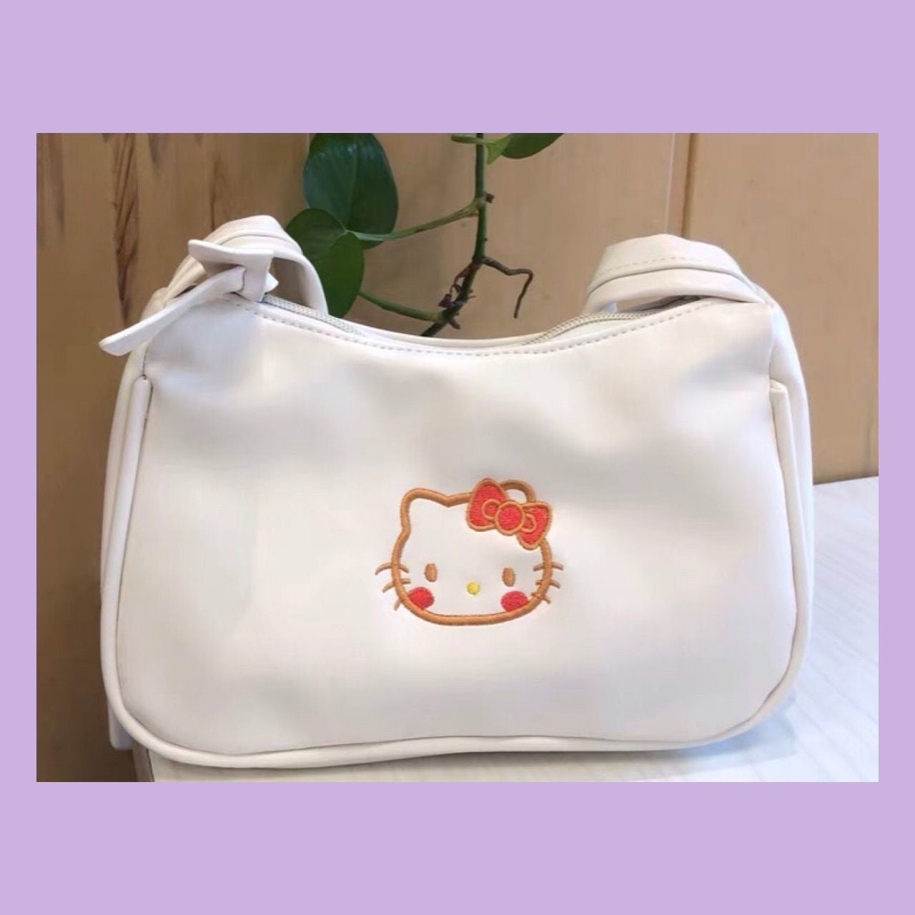 Hello kitty baguette outlet bag